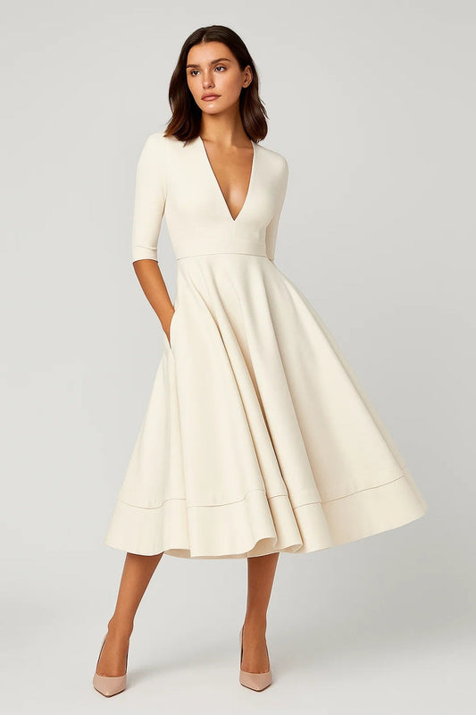 Robe midi élégante | Coupe évasée | Décolleté en V profond | Silhouette féminine pour un style intemporel de mi-saison