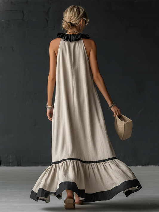 Femme portant une robe maxi color-blocking à volants