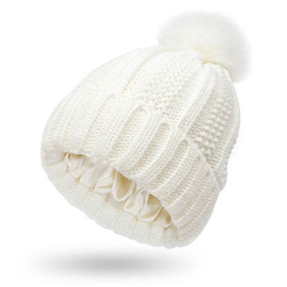 Bonnet femme doublé satin avec pompon fausse fourrure