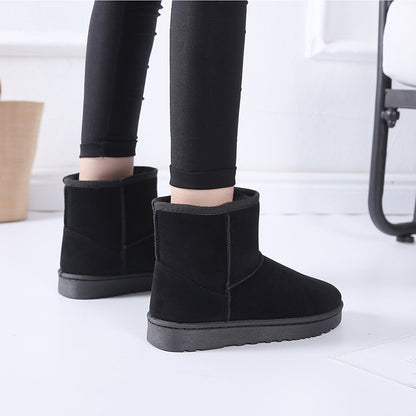 Bottes d'hiver femme à fourrure synthétique vue de profil