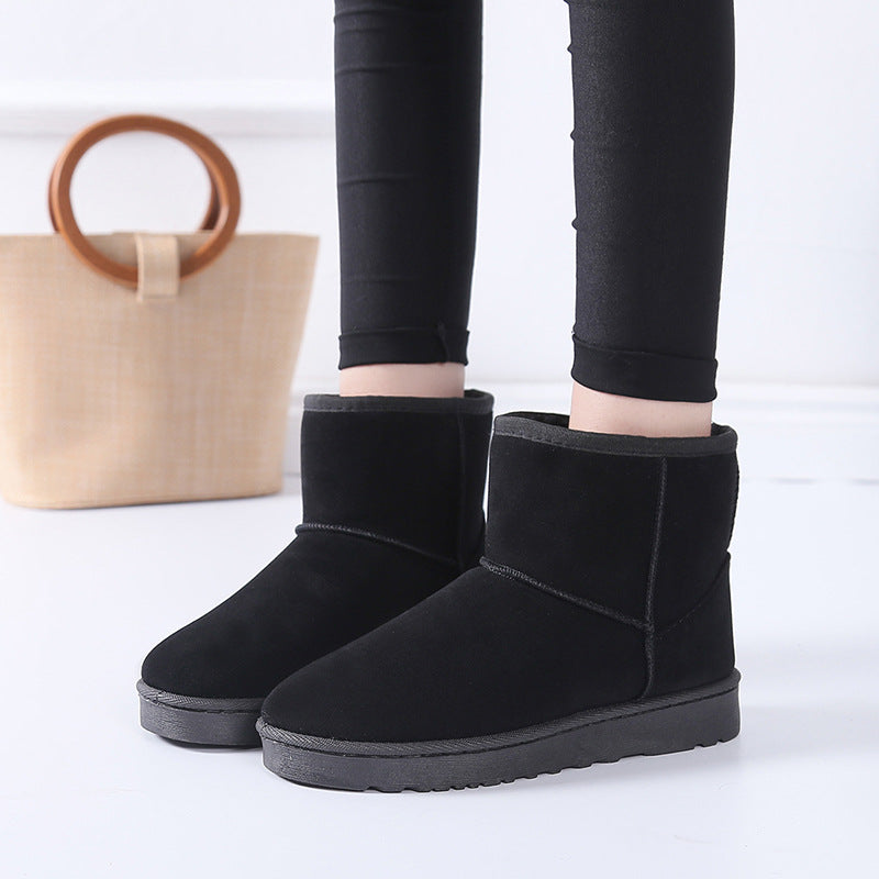 Bottes d'hiver femme à fourrure synthétique vue de profil