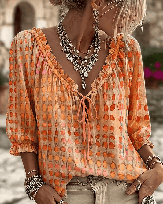 Blouse femme à pois avec col V à lacets