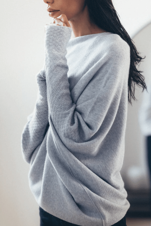Pull femme à coupe asymétrique