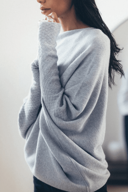 Pull femme à coupe asymétrique