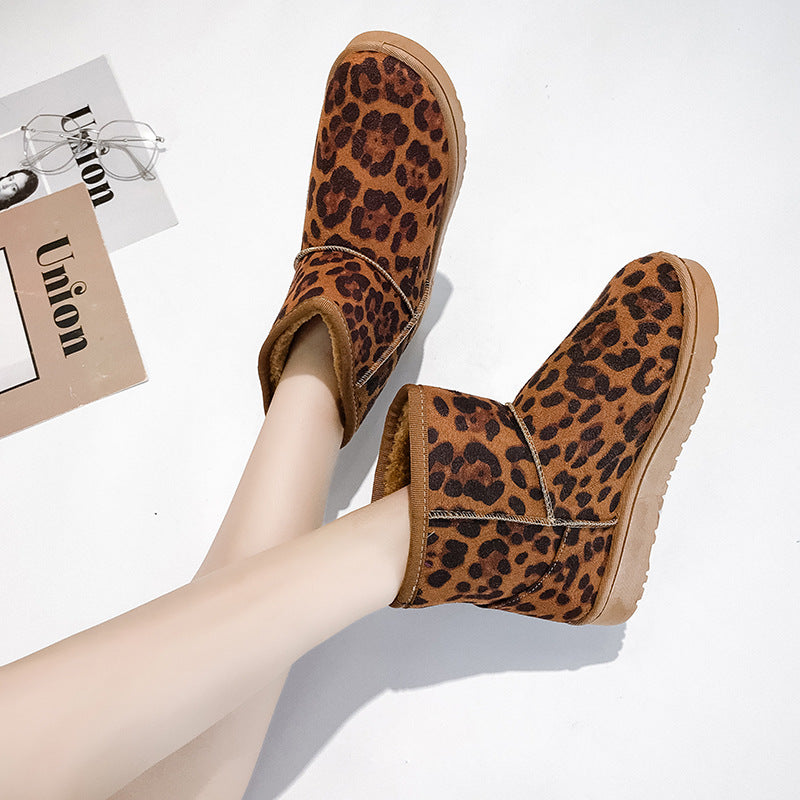 Bottes d'hiver femme à fourrure synthétique vue de profil