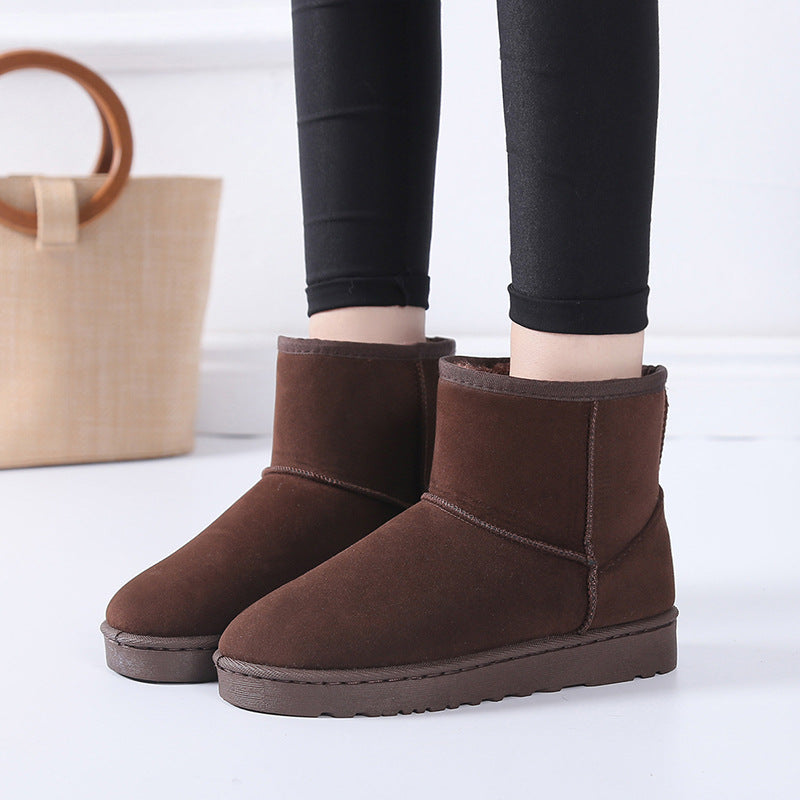 Bottes d'hiver femme à fourrure synthétique vue de profil