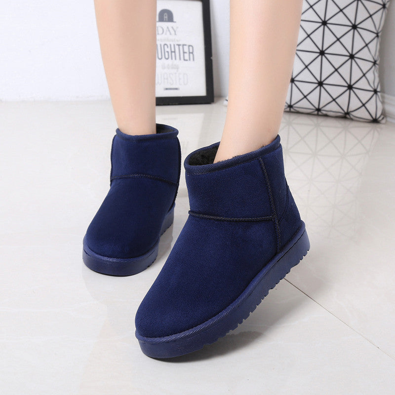 Bottes d'hiver femme à fourrure synthétique vue de profil