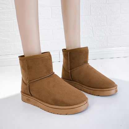 Bottes d'hiver femme à fourrure synthétique vue de profil