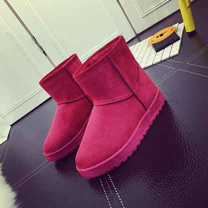 Bottes d'hiver femme à fourrure synthétique vue de profil