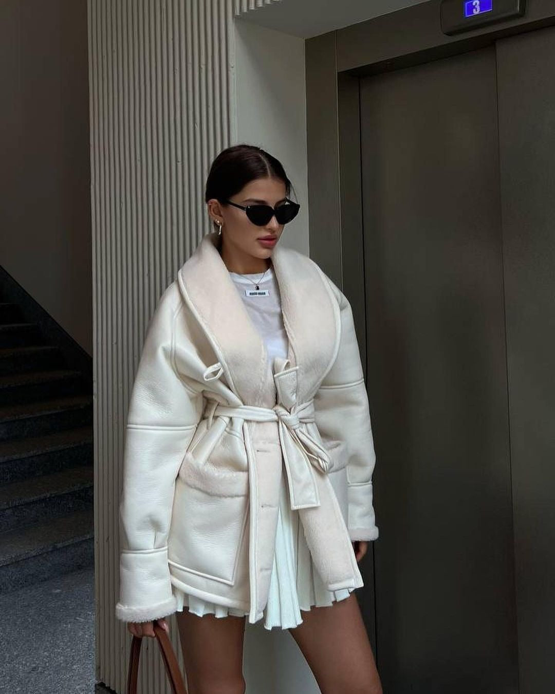 Manteau femme long en similicuir à poches