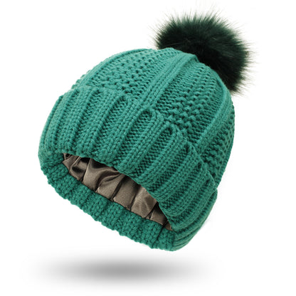 Bonnet femme doublé satin avec pompon fausse fourrure