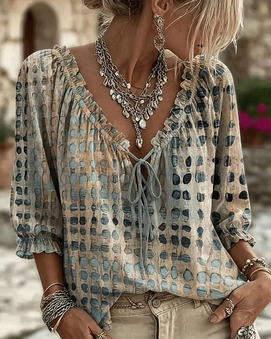 Blouse femme à pois avec col V à lacets