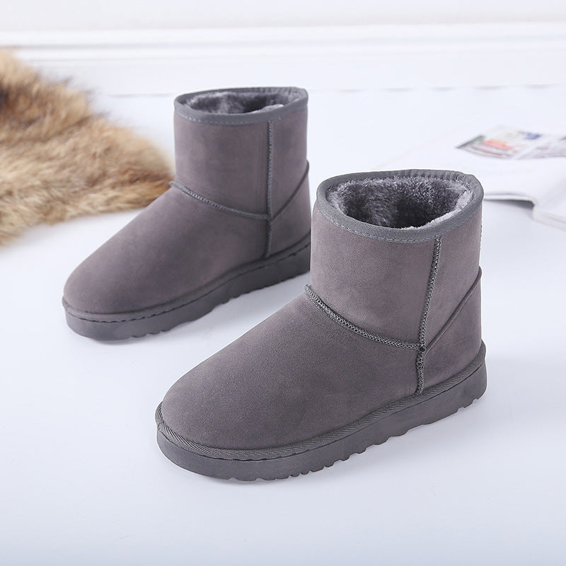 Bottes d'hiver femme à fourrure synthétique vue de profil
