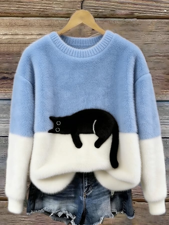 Femme portant pull tricot motif chat endormi