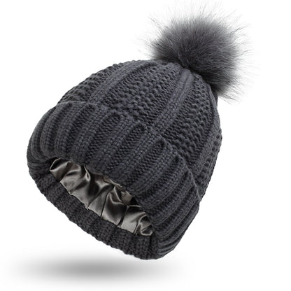 Bonnet femme doublé satin avec pompon fausse fourrure