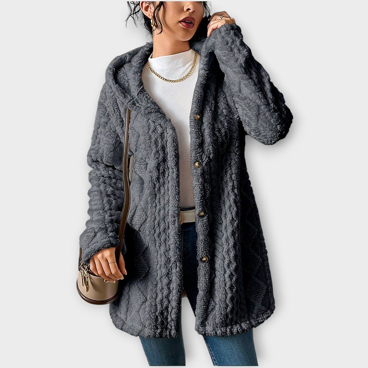 Femme en veste à capuche texturée d’hiver coupe décontractée