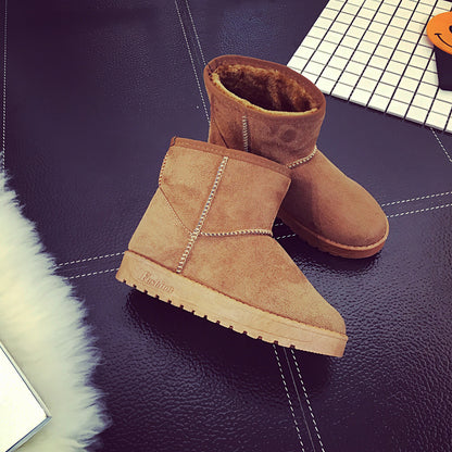 Bottes d'hiver femme à fourrure synthétique vue de profil