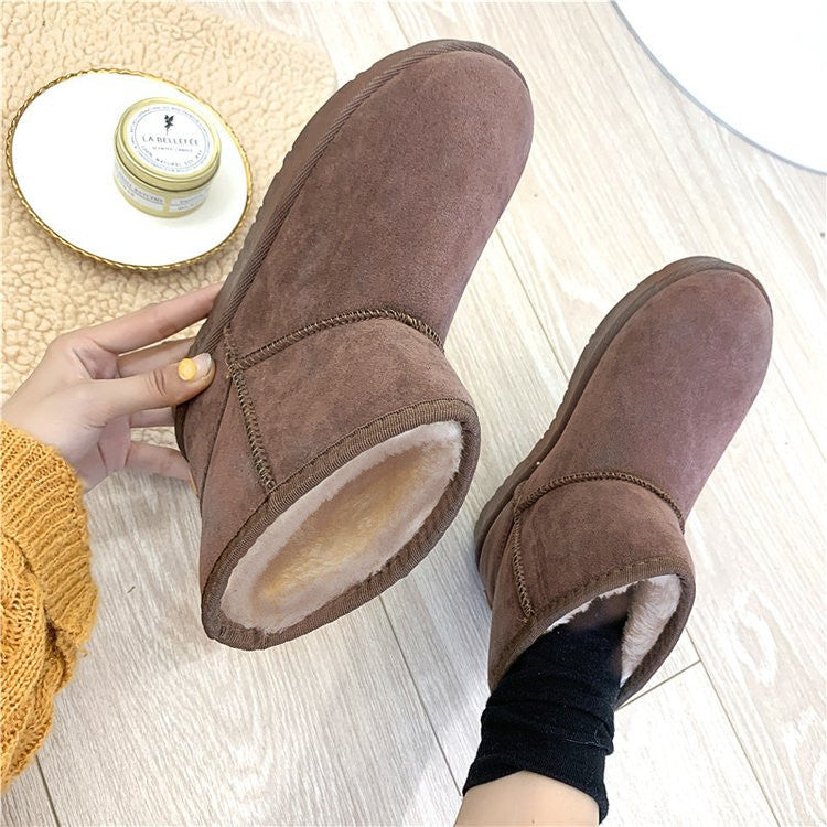 Bottes d'hiver femme à fourrure synthétique vue de profil