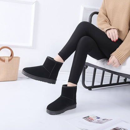 Bottes d'hiver femme à fourrure synthétique vue de profil