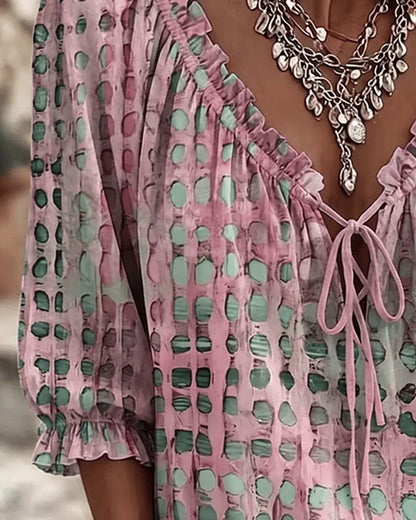 Blouse femme à pois avec col V à lacets