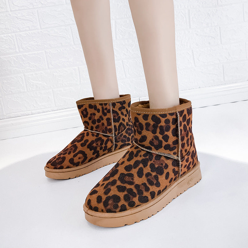Bottes d'hiver femme à fourrure synthétique vue de profil