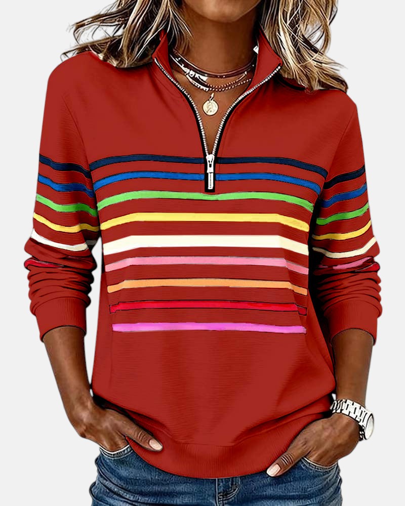 Femme en sweat zippé à rayures arc-en-ciel