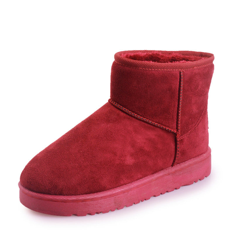 Bottes d'hiver femme à fourrure synthétique vue de profil