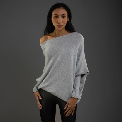 Pull femme à coupe asymétrique