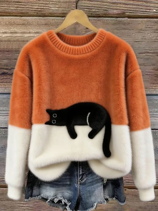 Femme portant pull tricot motif chat endormi