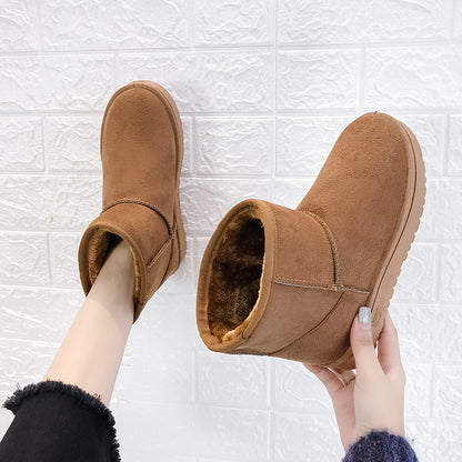 Bottes d'hiver femme à fourrure synthétique vue de profil