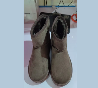 Bottes d'hiver femme à fourrure synthétique vue de profil
