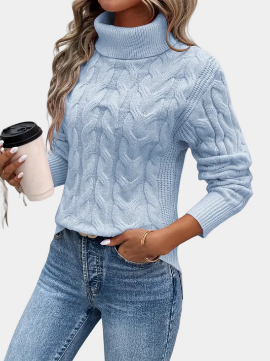 Pull femme torsadé à col montant