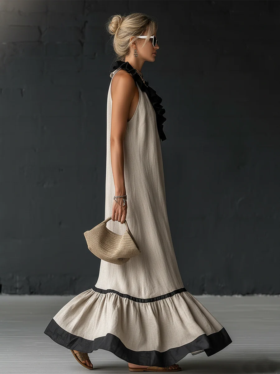 Femme portant une robe maxi color-blocking à volants