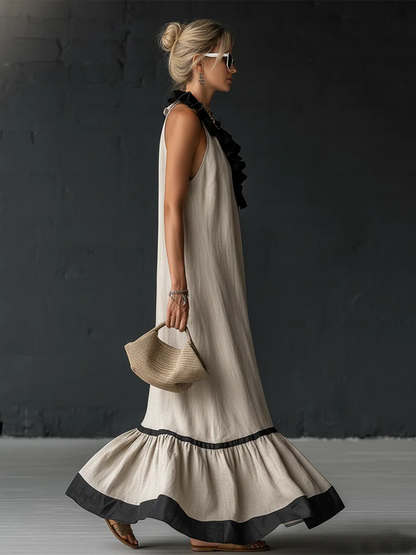 Femme portant une robe maxi color-blocking à volants
