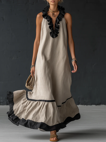 Femme portant une robe maxi color-blocking à volants
