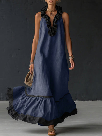 Femme portant une robe maxi color-blocking à volants